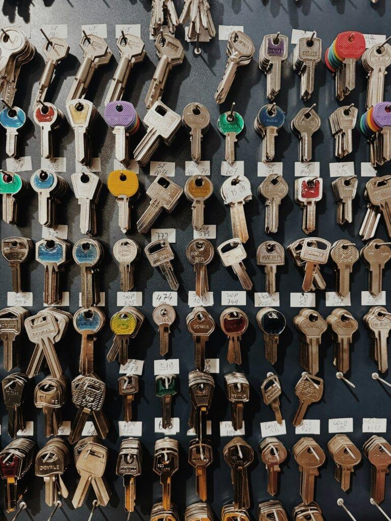 Wall of cut keys and key blanks at a professional locksmith shop serving Olney MD